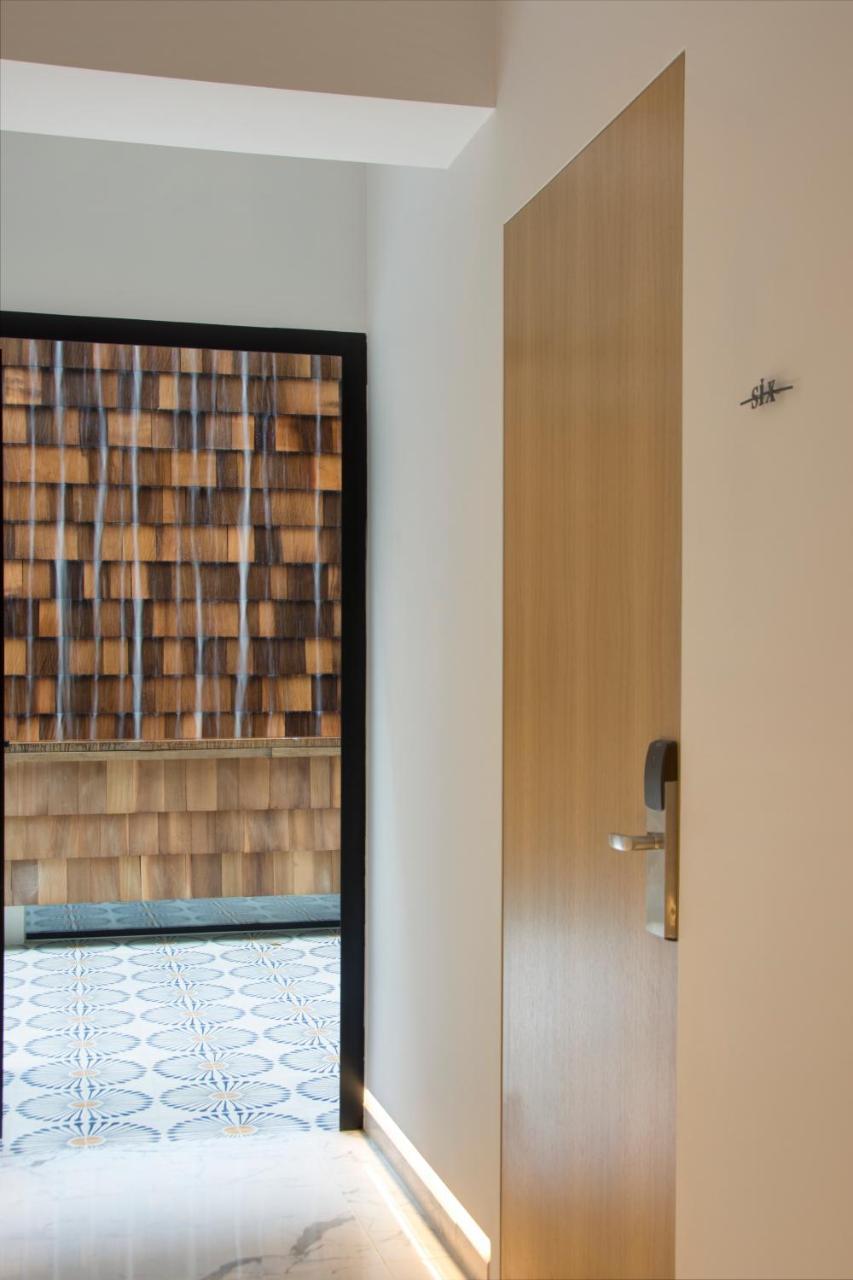 Coco-Mat Athens Jumelle Hotel Exterior foto A door with a water curtain